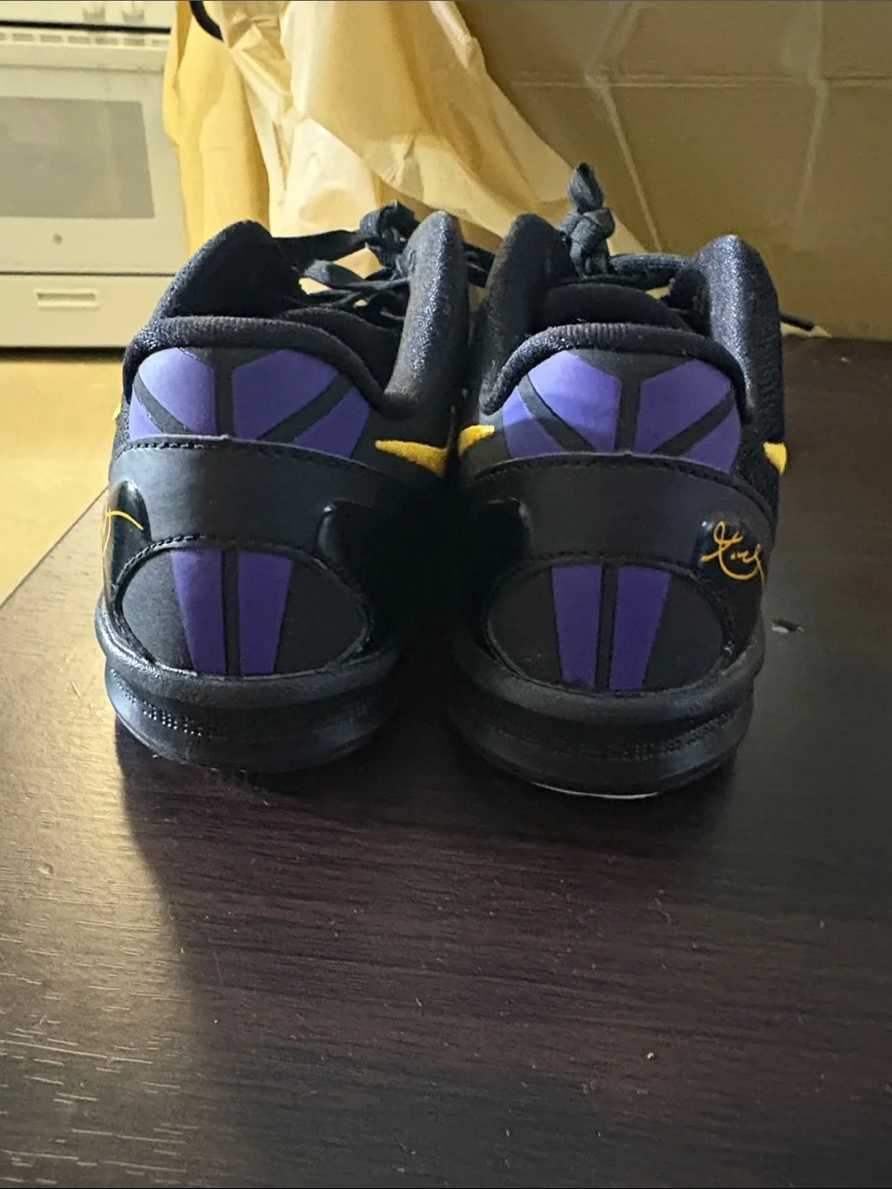 Nike Kobe Kids Black Sneakers with Gold Swoosh